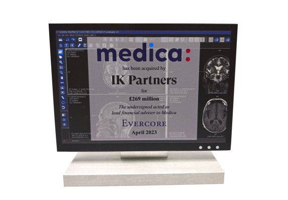 Luxury metal deal toy made into the shape of a computer monitor with medical imaging printed on screen