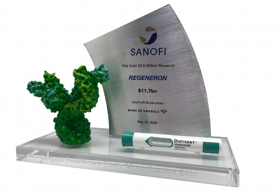 A high-end deal gift presented for a medical transaction. This piece includes an aluminum plaque and two models.