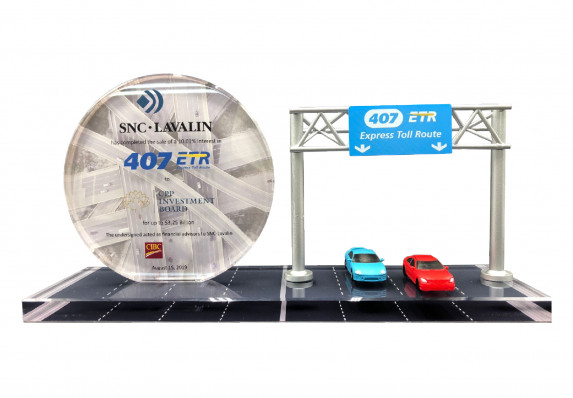 Luxury Deal GIft Tombstone Incorporates Reverse Color Printing and Complex Models to Create a Memorable Form for a Large Value Percentage Interest Sale.