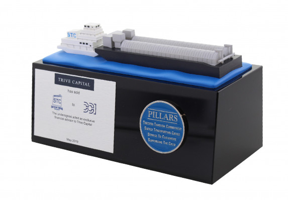 A Finely Crafted Deal Gift Crafted by Society Awards Finance Group that Incorporates a Model Cargo Ship on a Luxury Black Base With Medallion and Tombstone Plaque.