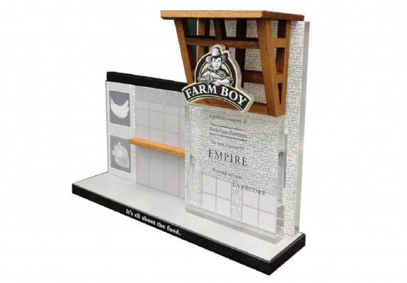 Custom deal gift created for a financial acquisition deal. This tombstone is modeled to look like a store front for a playful and intriguing effect.