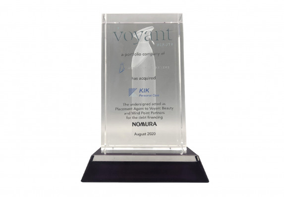 A 3D-etched product model is the centerpiece of this high-end crystal deal gift for the acquisition of a personal care brand.