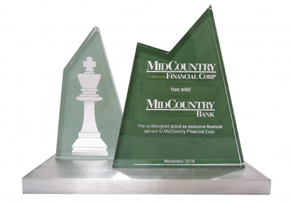 Crafted for a deal involving the sale of a bank brand, this deal toy incorporates two custom standing plaques with color printed designs on an aluminum base.