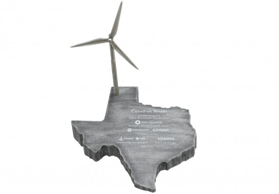 Metal deal gift in the shape of the state of Texas with a wind powered generator detail.