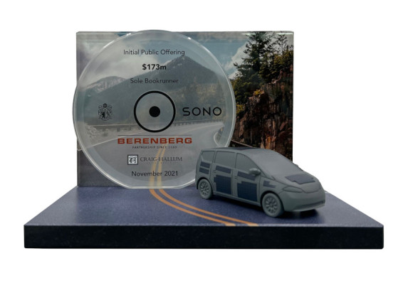 3D printed car with solar panels on granite base with road image - front