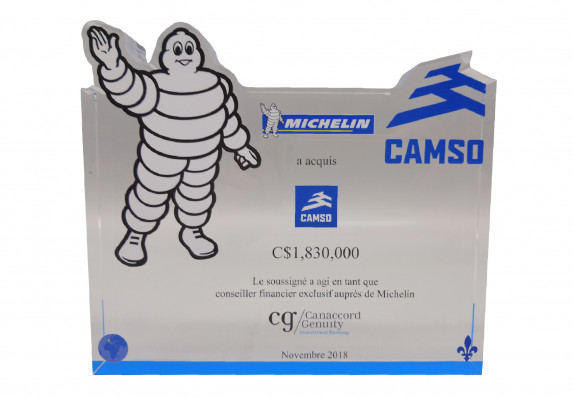 Financial Tombstone Crafted for an Acquisition Deal by a Large Brand. This Luxury Deal Toy Uses Color Printing and Large Logos to Create an Elegant Effect.