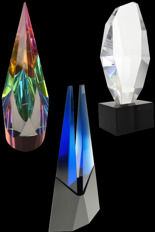 Exclusive Society Award custom crystal designs, the Blue Beams Crystal Award, the dichroic Dichro Crystal 2 Spire Award, the Gem Crystal Award