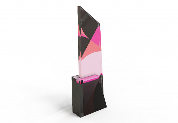 Asymmetrical award with multiple shades of pink atop a black base.
